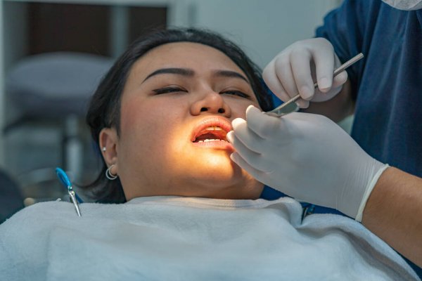 depositphotos_446279048-stock-photo-woman-having-dental-check-up
